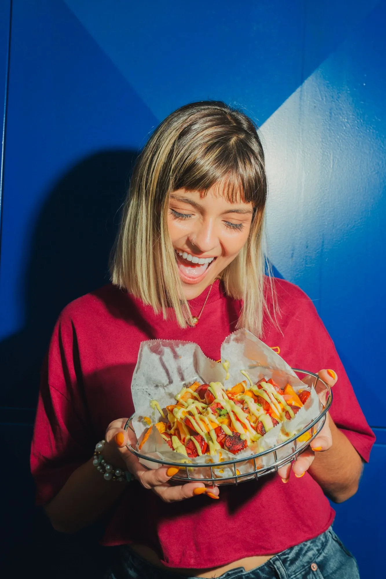 Customer with a La Caliente tray